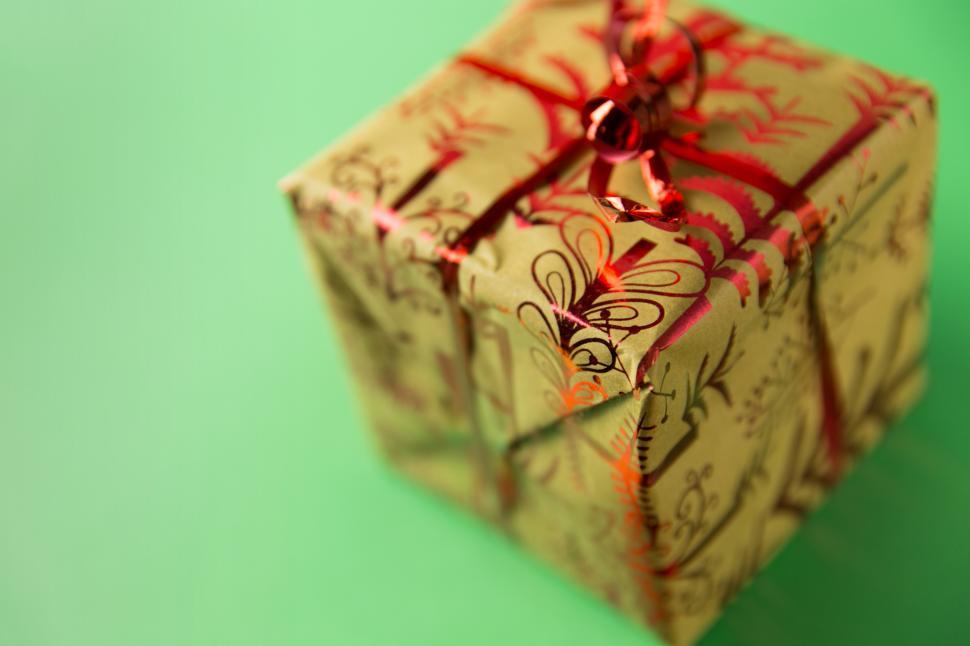 Free Image of A wrapped present with a red ribbon 