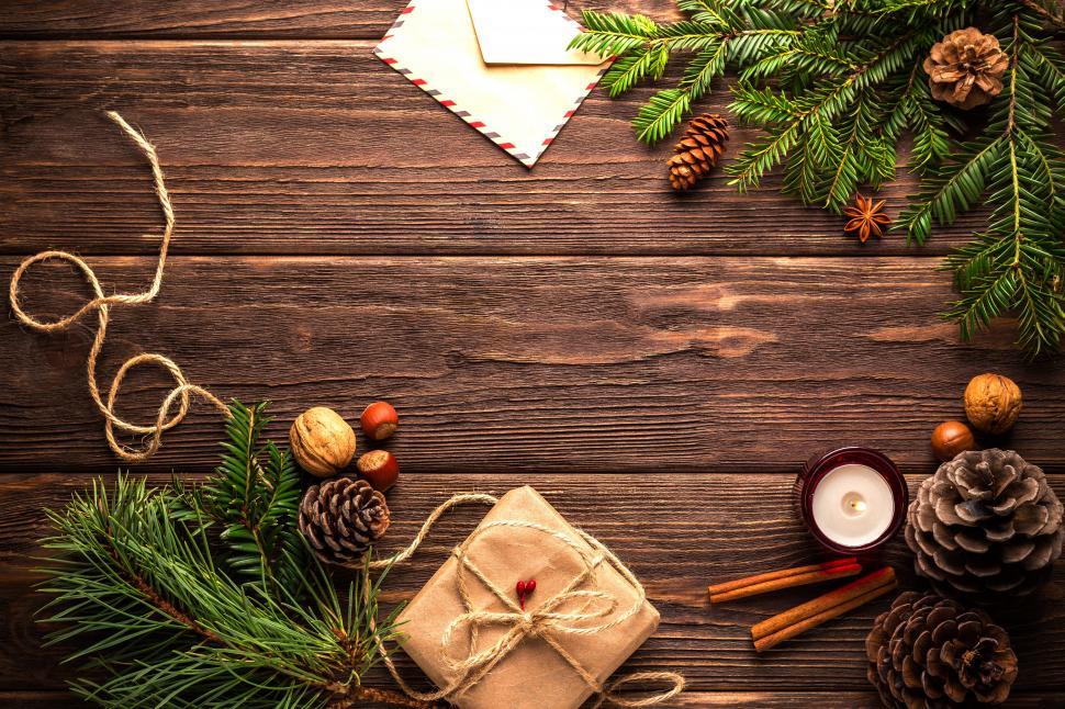 Free Image of A christmas decoration on a wood surface 
