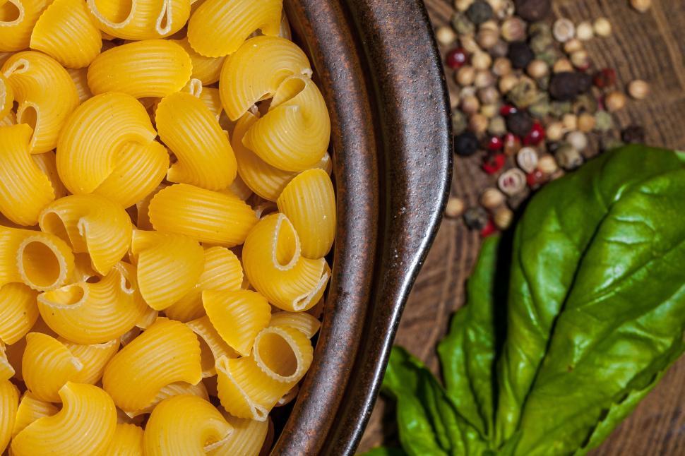 Free Image of A bowl of pasta and spices 