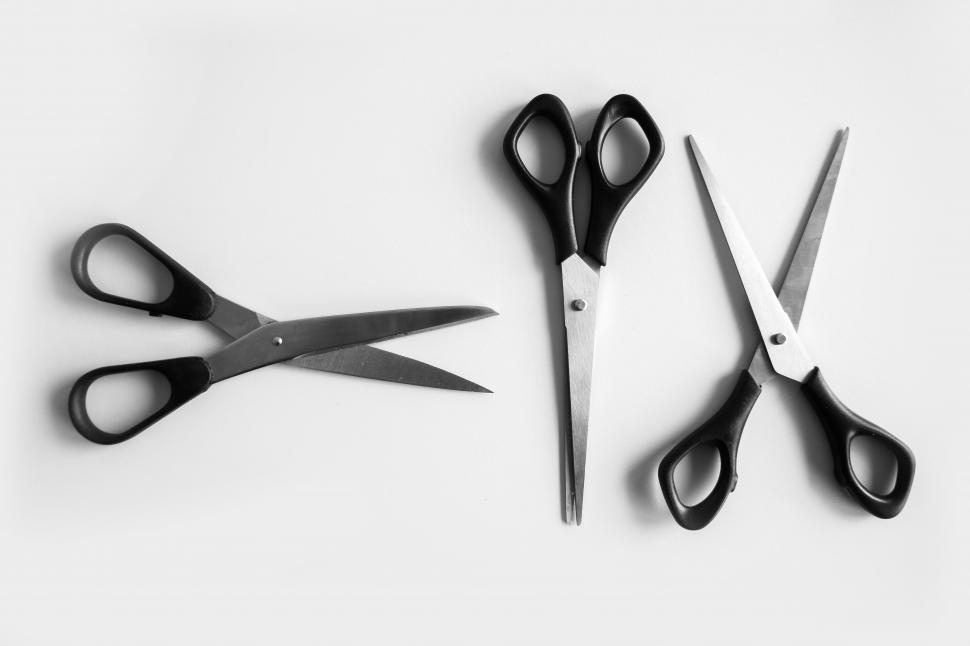 Free Image of A group of scissors with black handles 