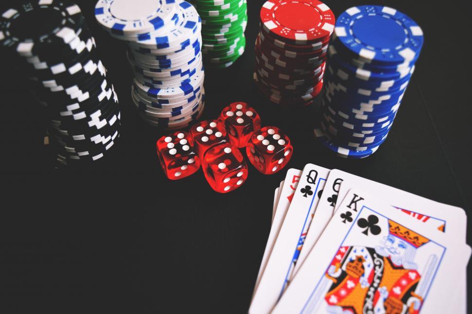 Free Image of A stack of poker chips and cards 