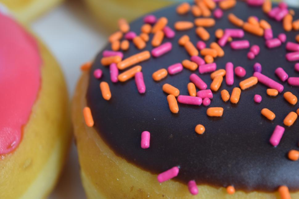 Free Image of A close up of a donut with sprinkles 