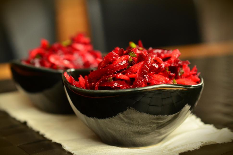 Free Image of A bowl of red food 