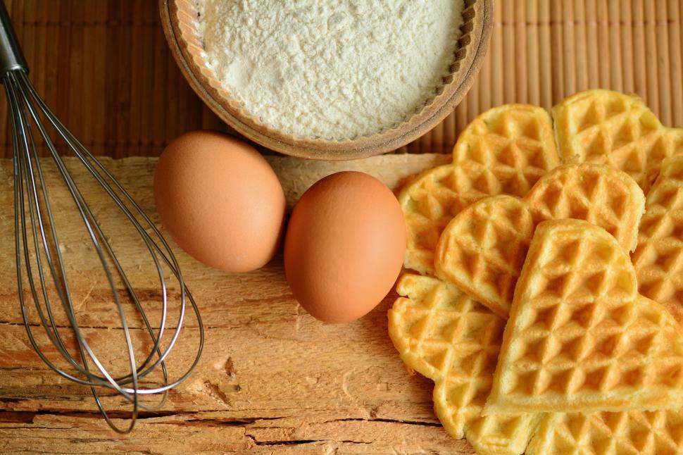 Free Image of A waffles and eggs on a table 