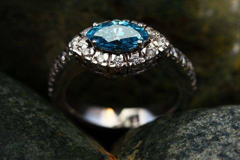 Free Image of A ring with a blue gem 