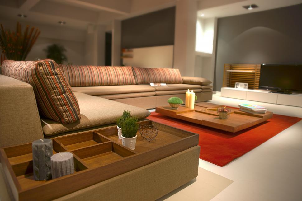 Free Image of A living room with a couch and coffee table 