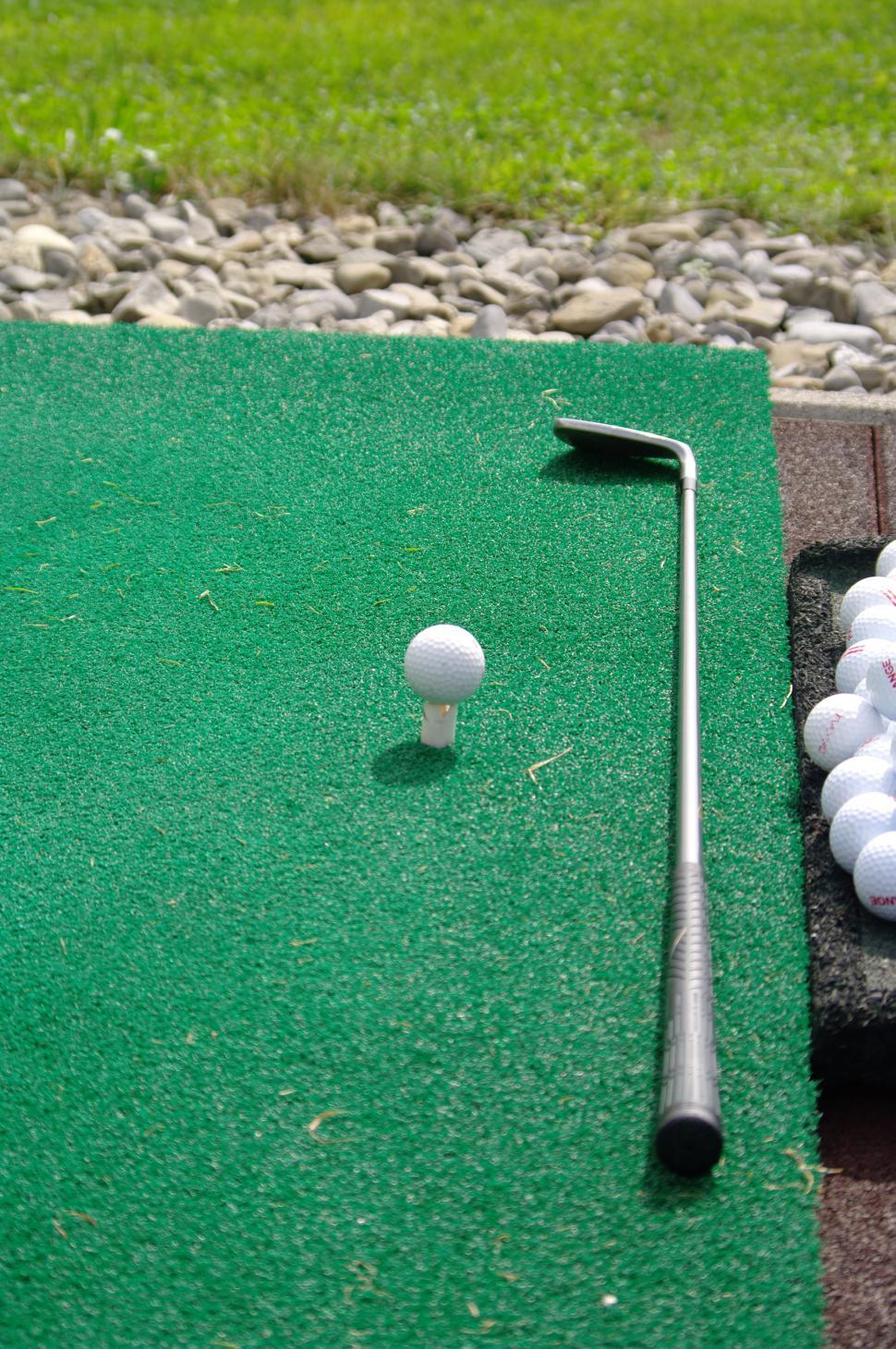 Free Image of Miniature Golf Course With Balls and Golf Club 