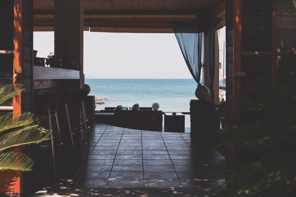 Free Image of A view of the ocean from a patio 