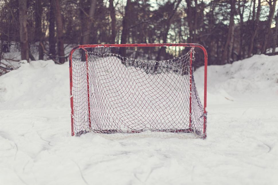 Free Image of A red and white net in the snow 