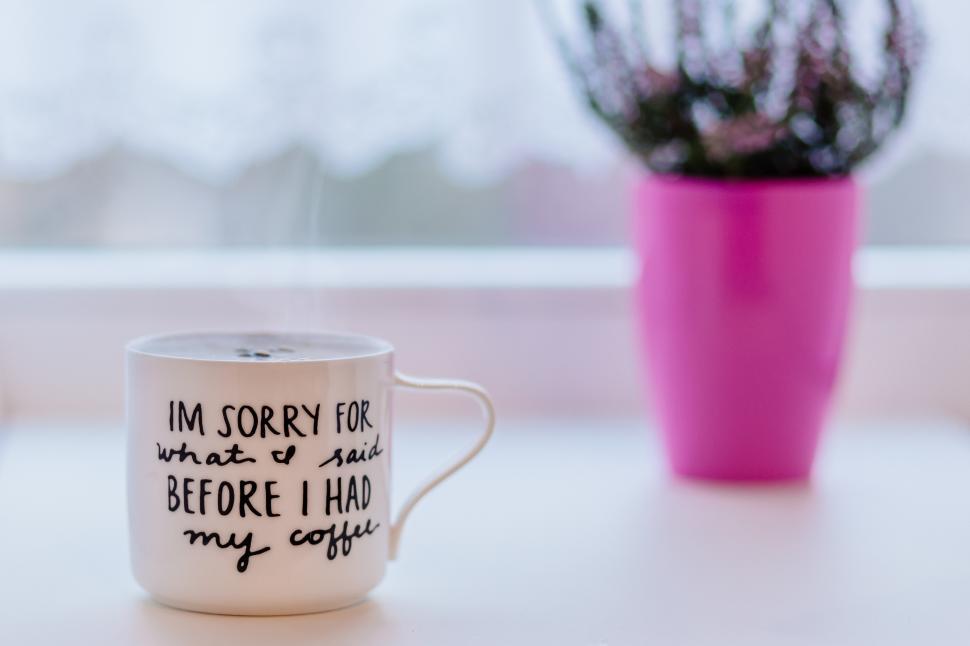 Free Image of A cup with writing on it 
