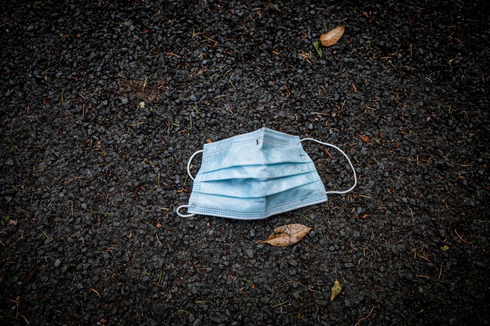 Free Image of A face mask on the ground 