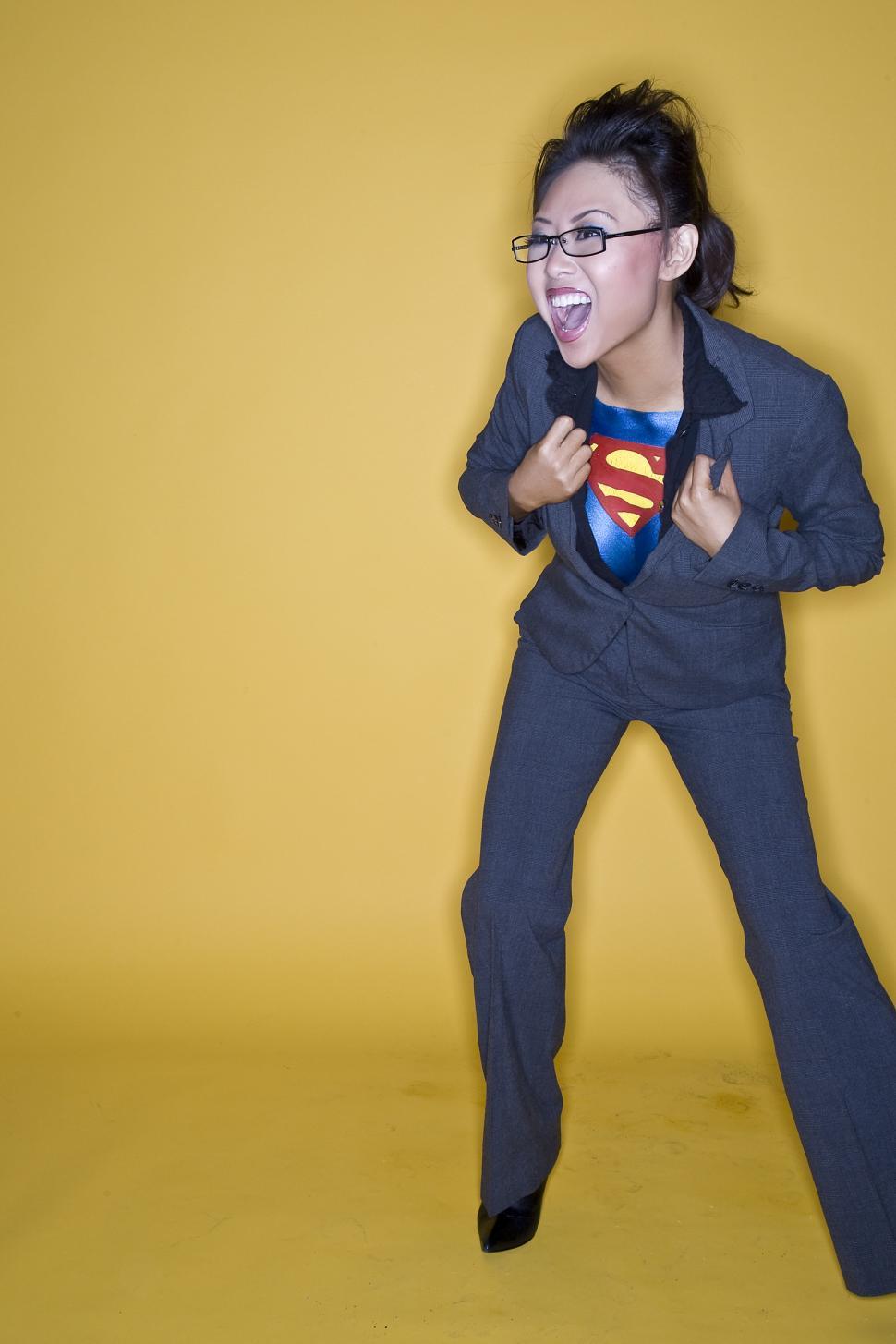 Free Image of Woman Dressed in Superman Suit Posing for Picture 