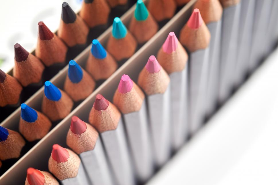 Free Image of A group of colored pencils in a box 