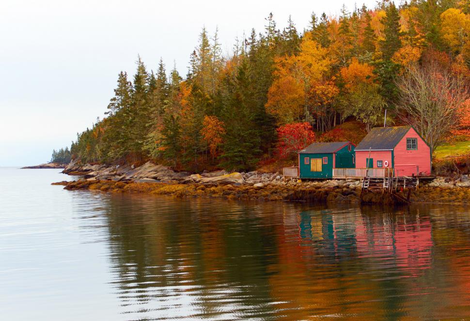 Free Image of A houses on a shore of a lake 