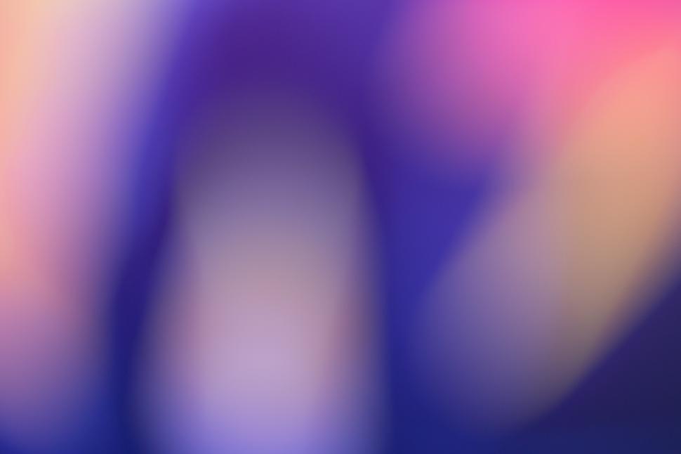 Free Image of A blurry image of a blue and pink background 