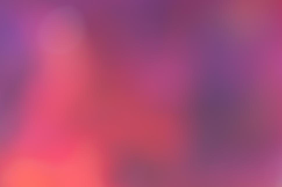 Free Image of A blurry image of a pink and purple background 