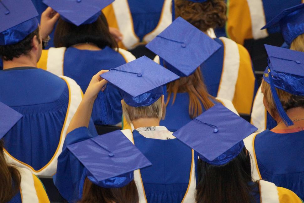 Free Image of A group of people wearing graduation caps 