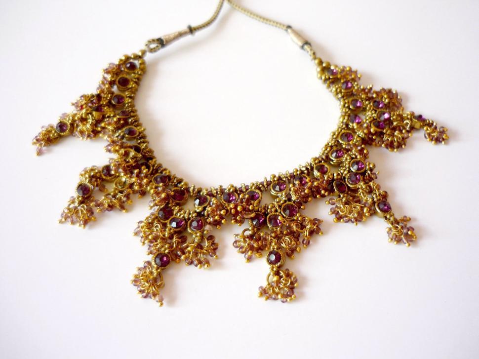 Free Image of Gold and Red Bead Necklace 