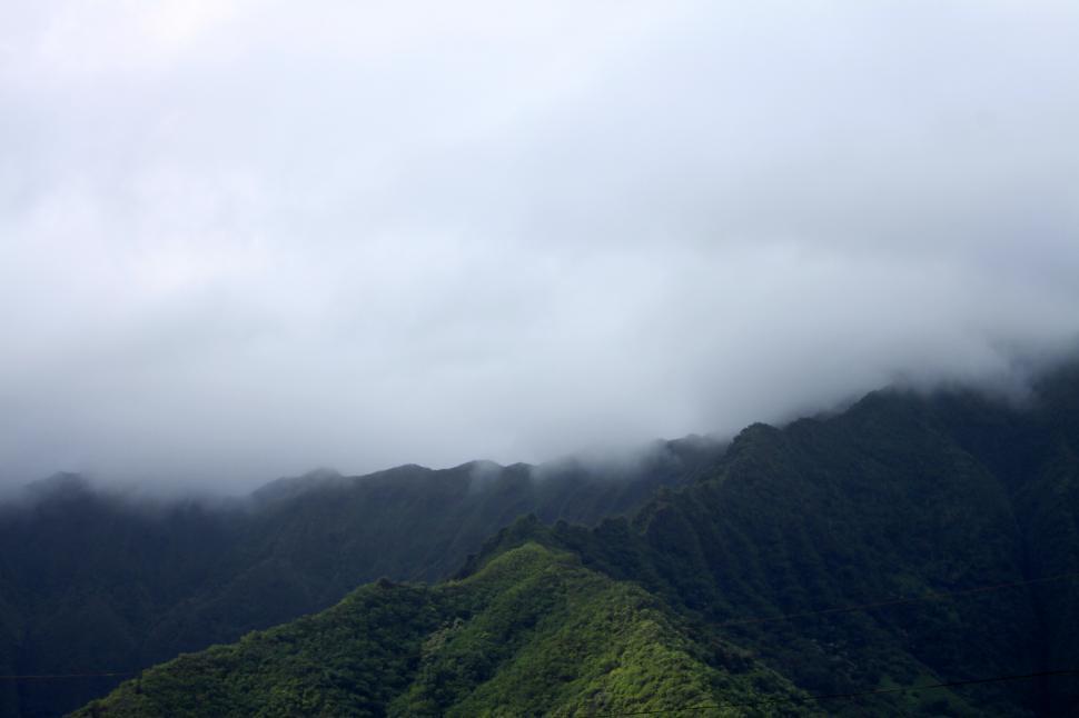 Free Image of A foggy mountain range 