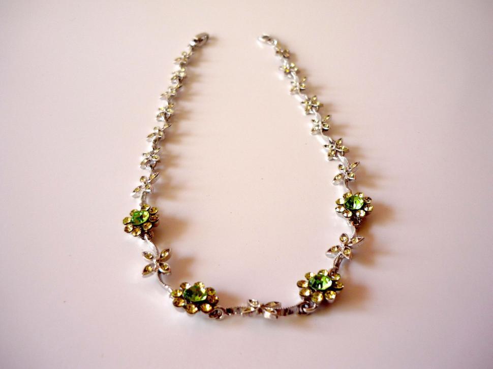 Free Image of Beaded Necklace With Green and White Beads 