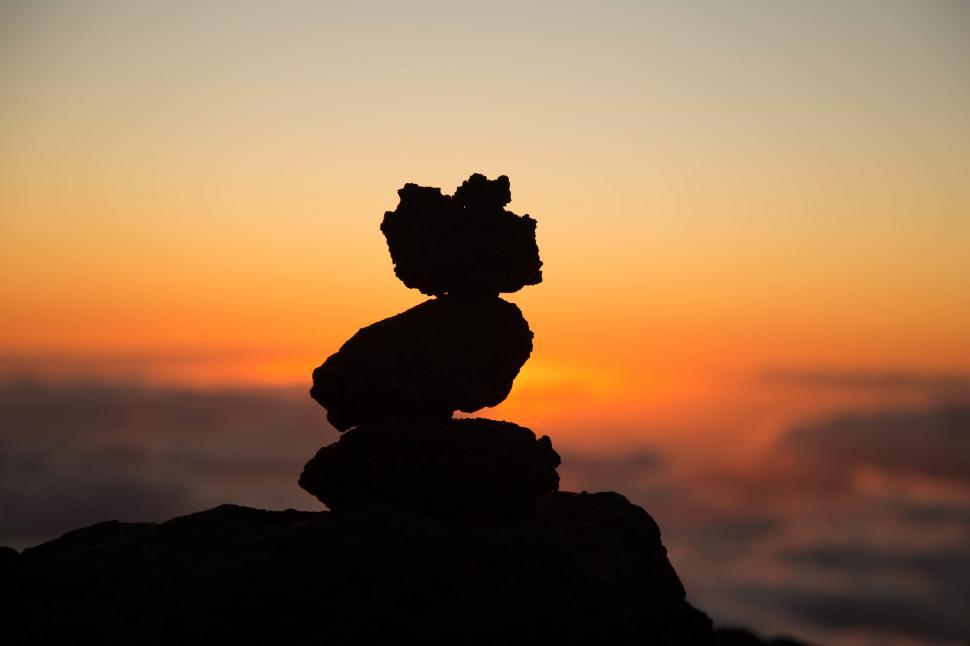 Free Image of A stack of rocks in the sunset 