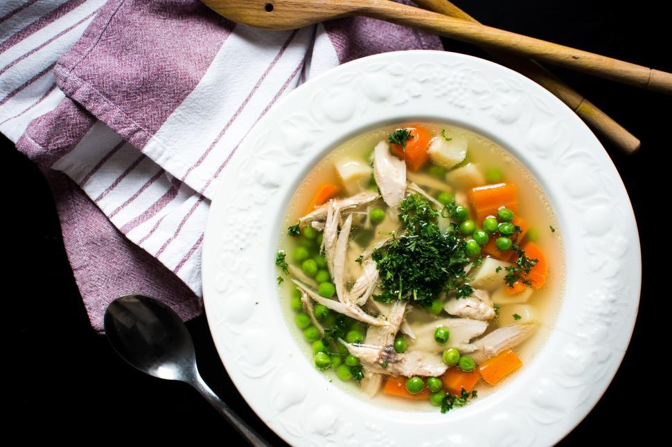 Free Image of A bowl of soup with vegetables and meat 
