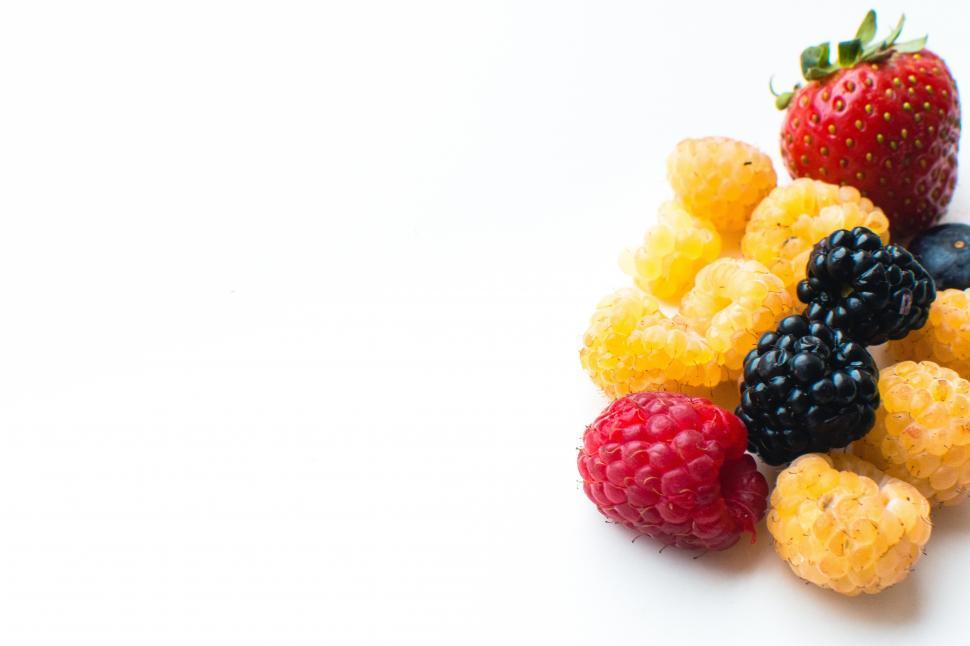 Free Image of A group of raspberries and strawberries 