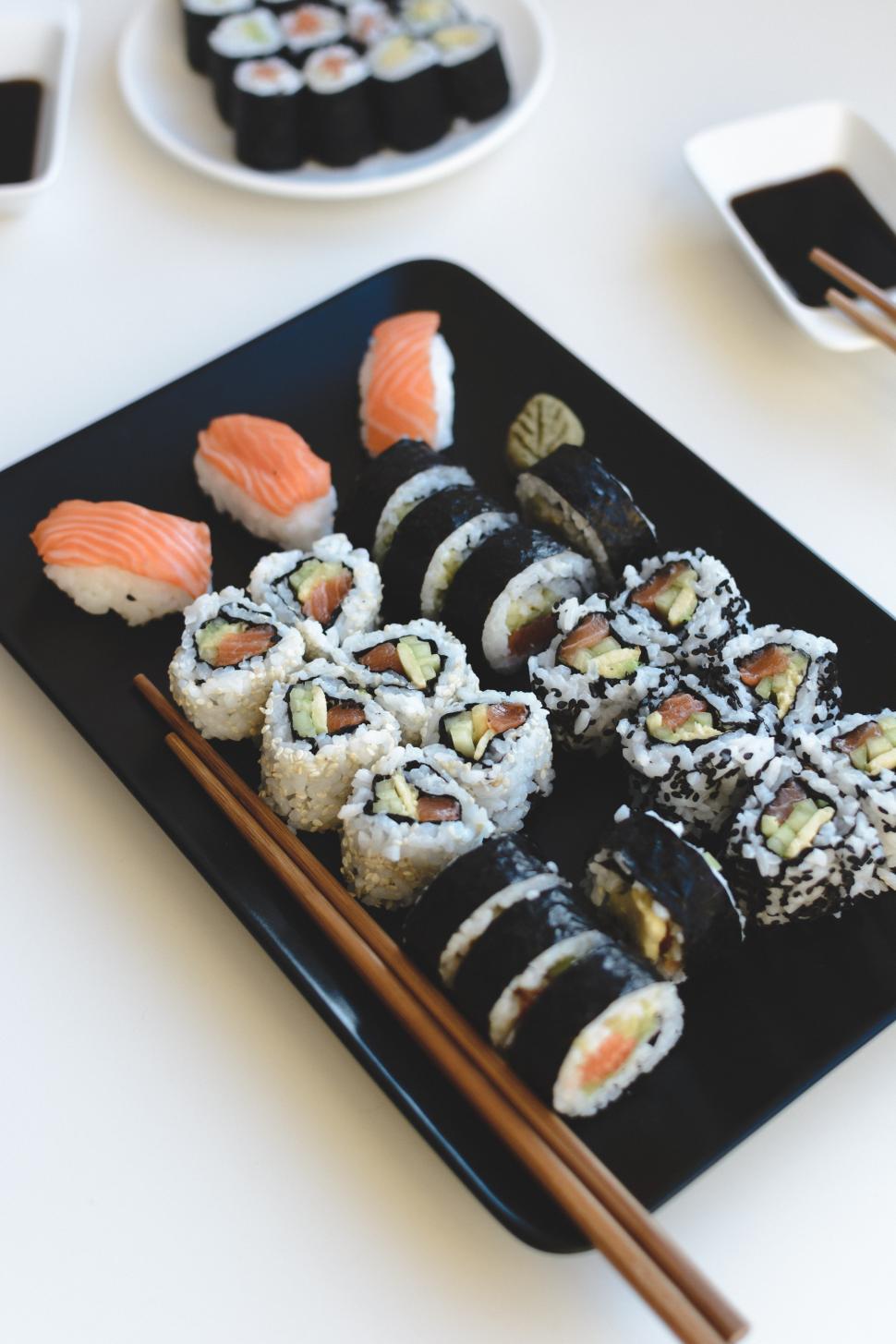 Free Image of A plate of sushi on a table 