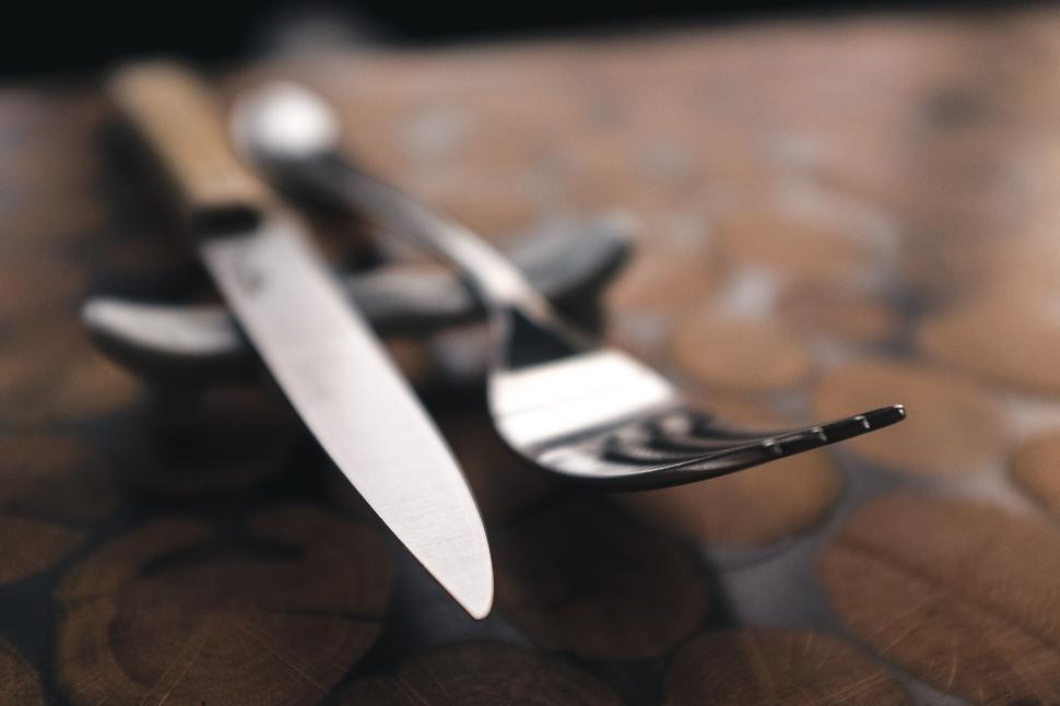 Free Image of A fork and knife on a table 