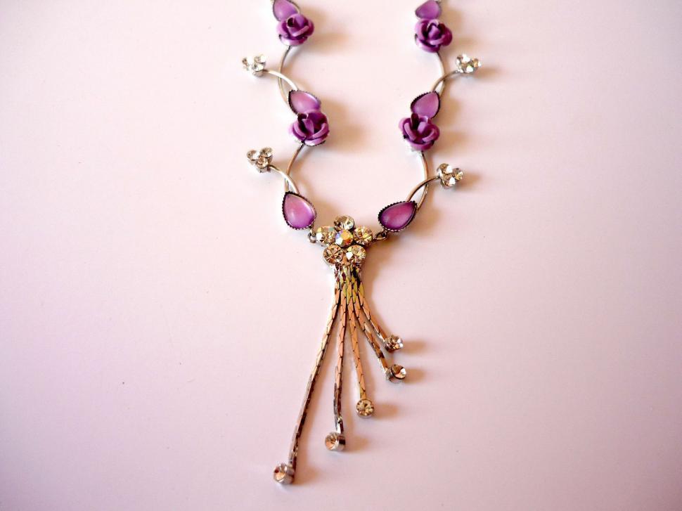 Free Image of Necklace With Beads Hanging 
