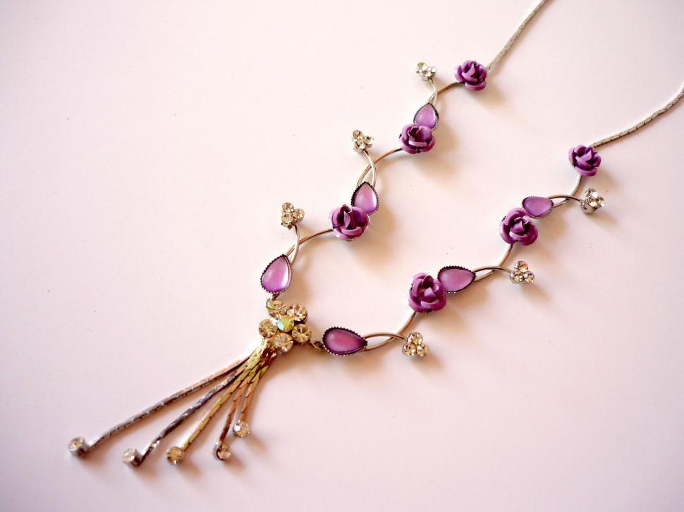 Free Image of Necklace With Purple Beads and Tassel 