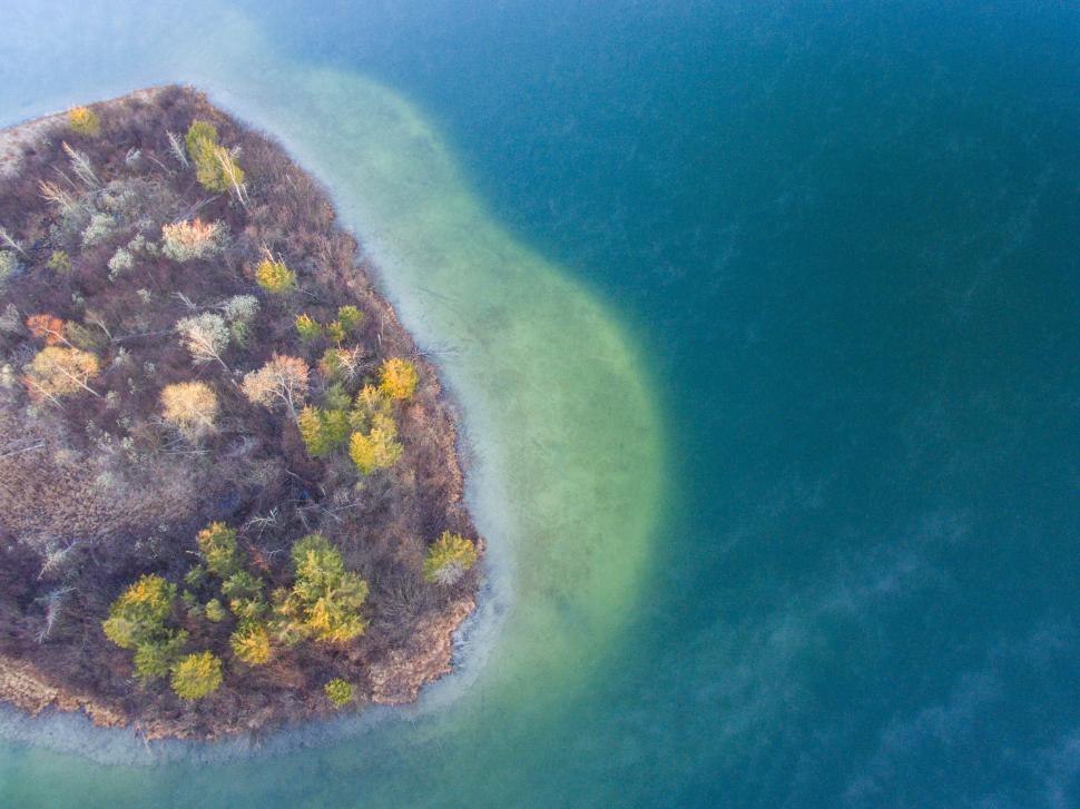 Free Image of An island surrounded by water 