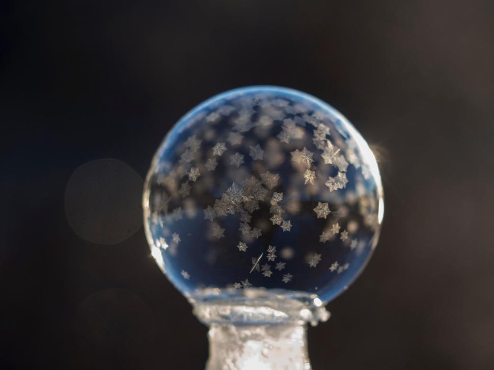 Free Image of A snowflakes in a glass ball 