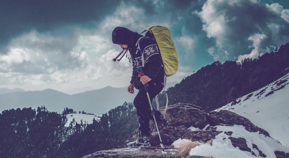 Free Image of A person hiking on a mountain 