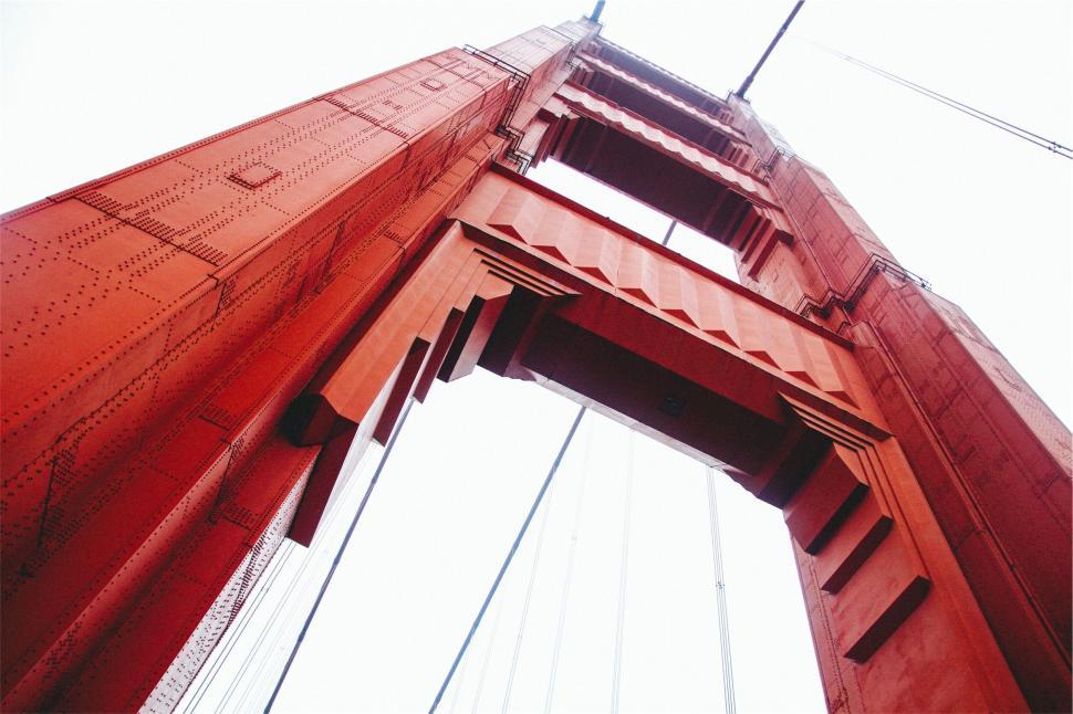 Free Image of Looking up view of a red bridge 
