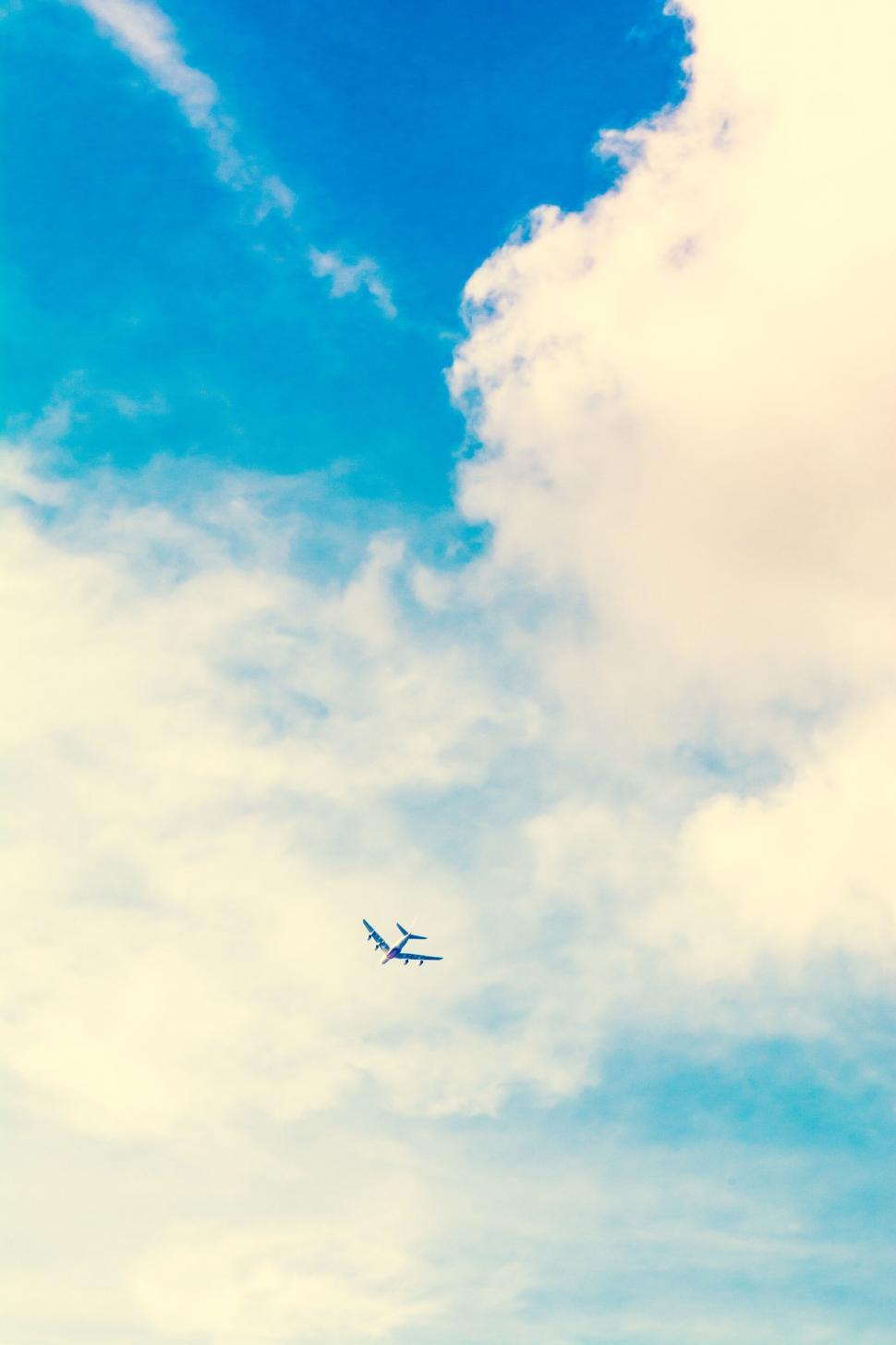 Free Image of An airplane flying in the sky 