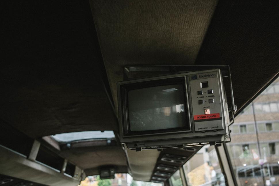 Free Image of A small television on a bus 
