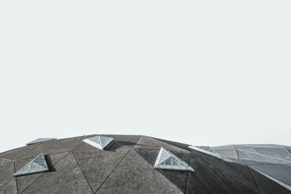 Free Image of A roof with triangular windows 