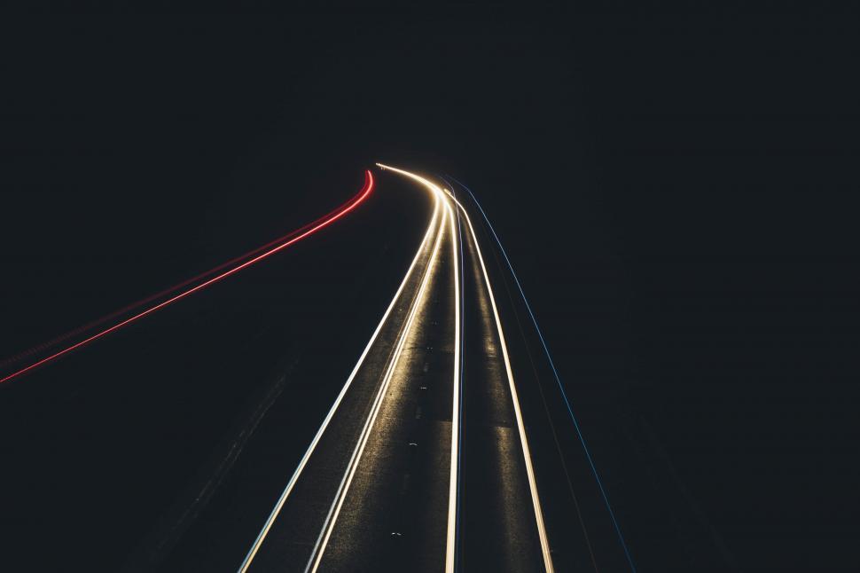 Free Image of A light trails on a road 