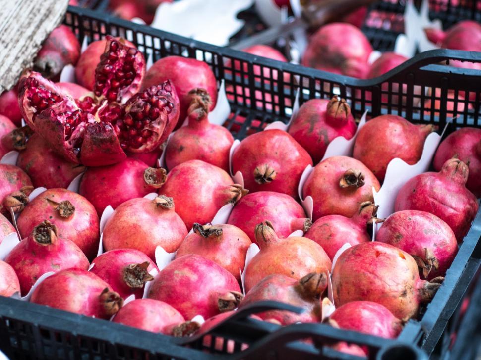 Free Image of A basket of pomegranates 