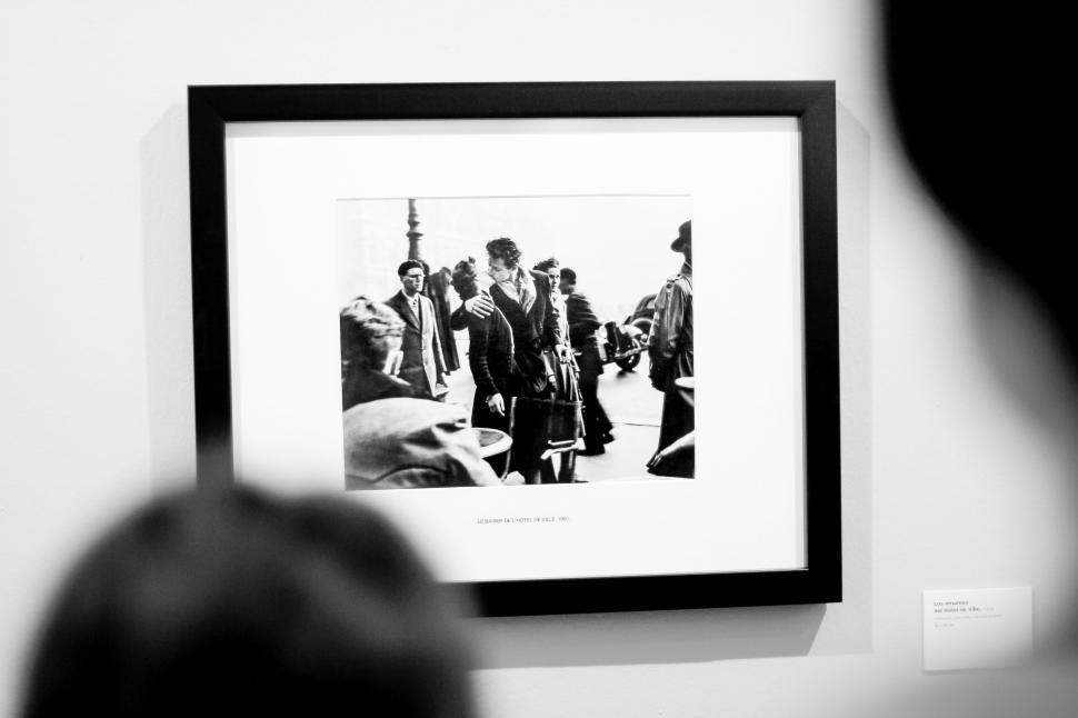 Free Image of A black and white photo of people in a black frame 