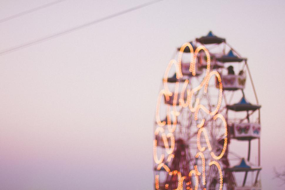 Free Image of A ferris wheel with lights 