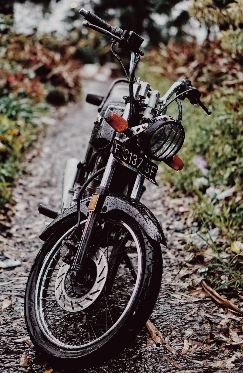Free Image of A motorcycle parked on a path 