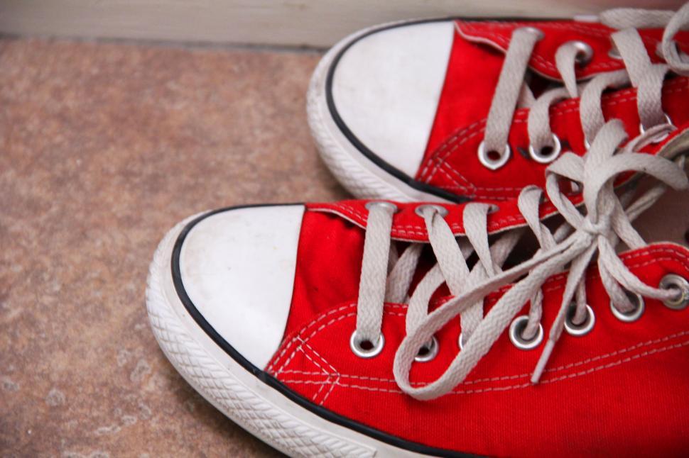 Free Image of A pair of red sneakers 