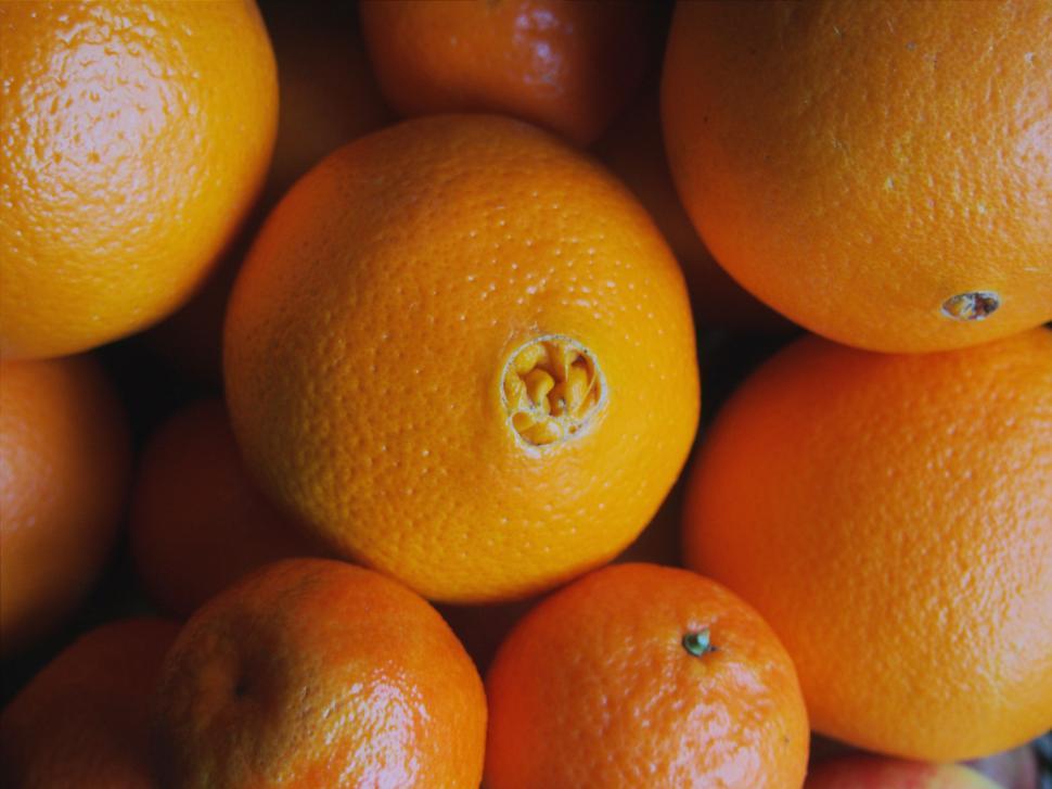 Free Image of A group of oranges and oranges 