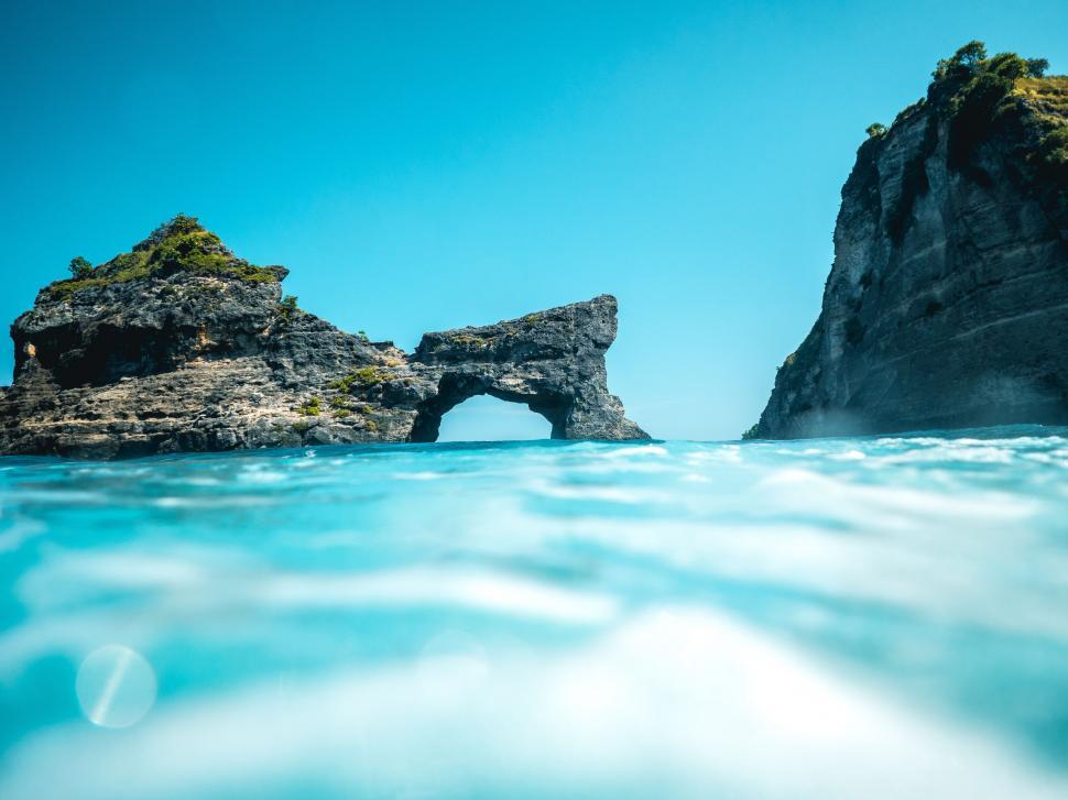 Free Image of A rock formation in the water 