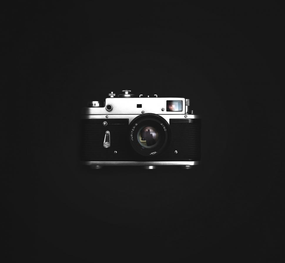 Free Image of A camera on a black background 