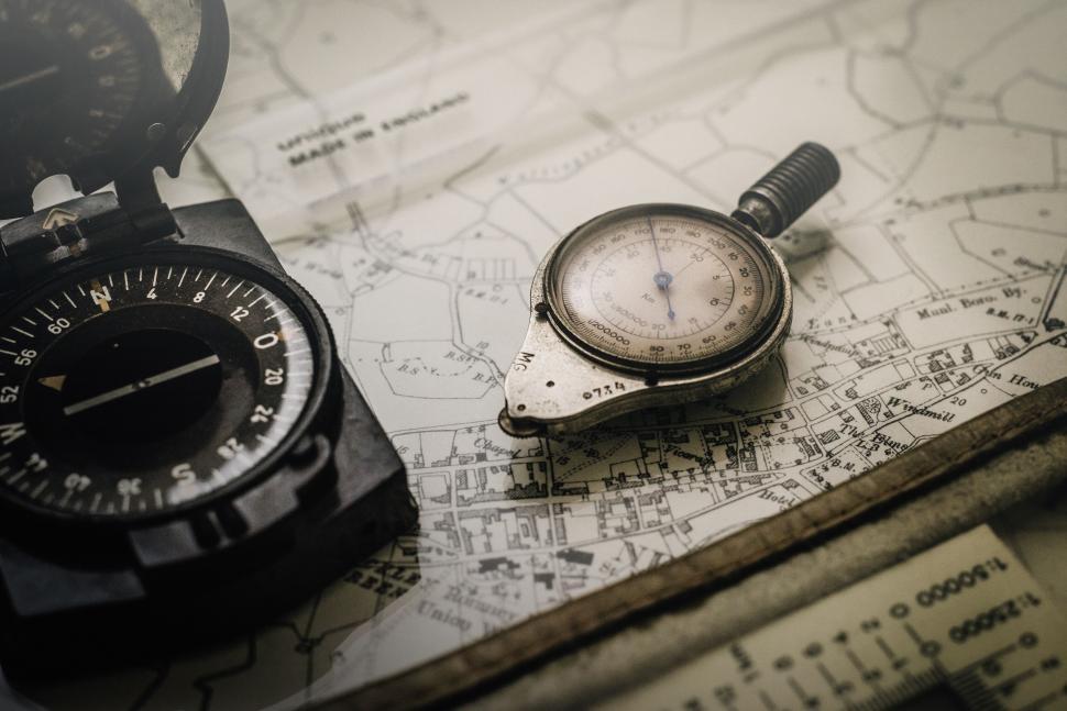 Free Image of A compass and a map 
