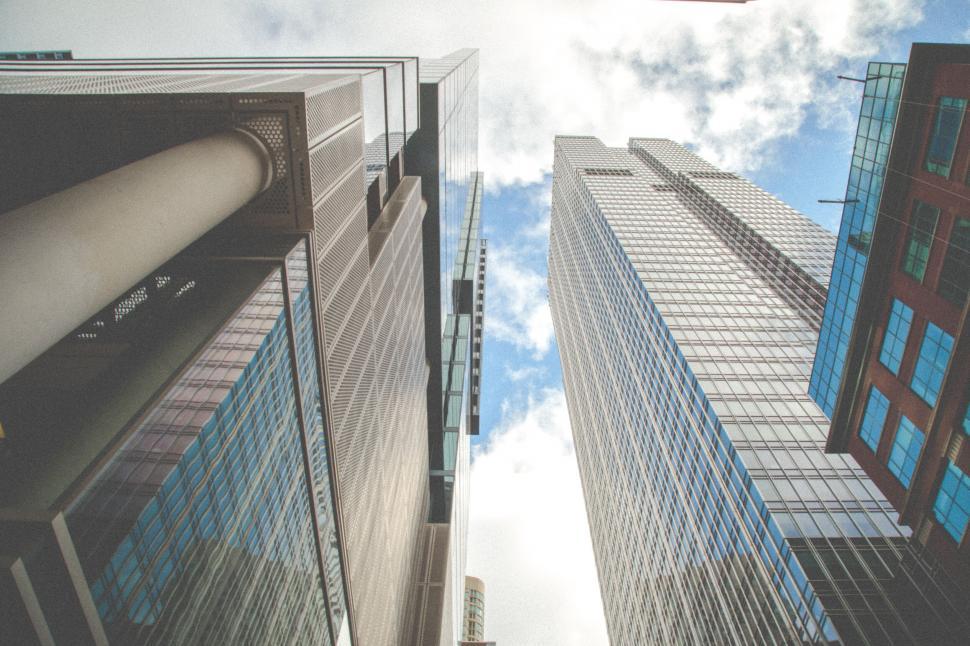 Free Image of Looking up view of tall buildings 