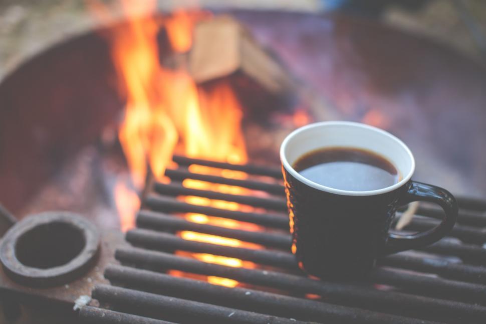 Free Image of A cup of coffee on a grill 